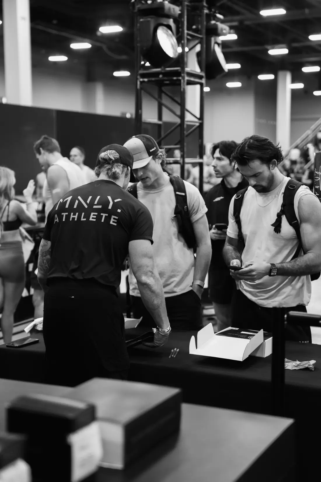 Team MNLY athletes at a busy race-weekend expo